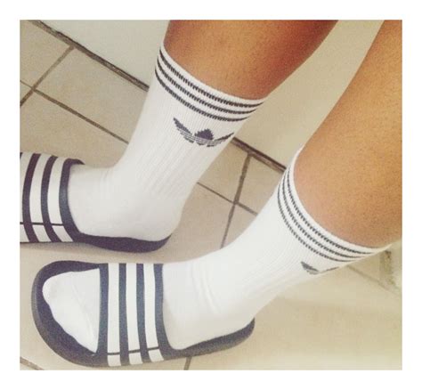 adidas slides with socks trend.